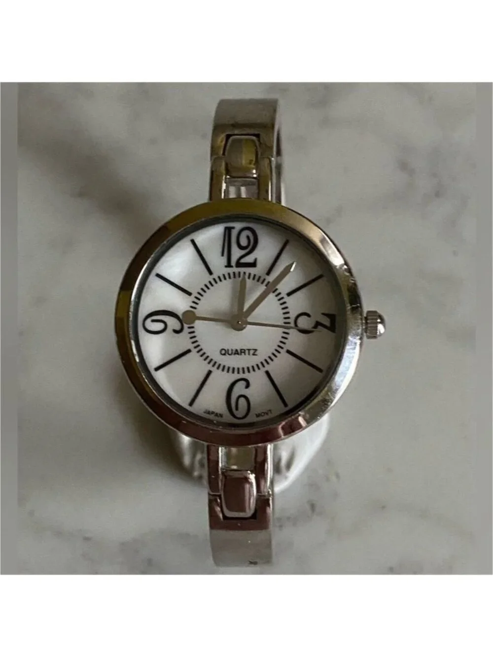 Avon Silver-tone Contemporary Classic Cuff Watch with Large Numbers